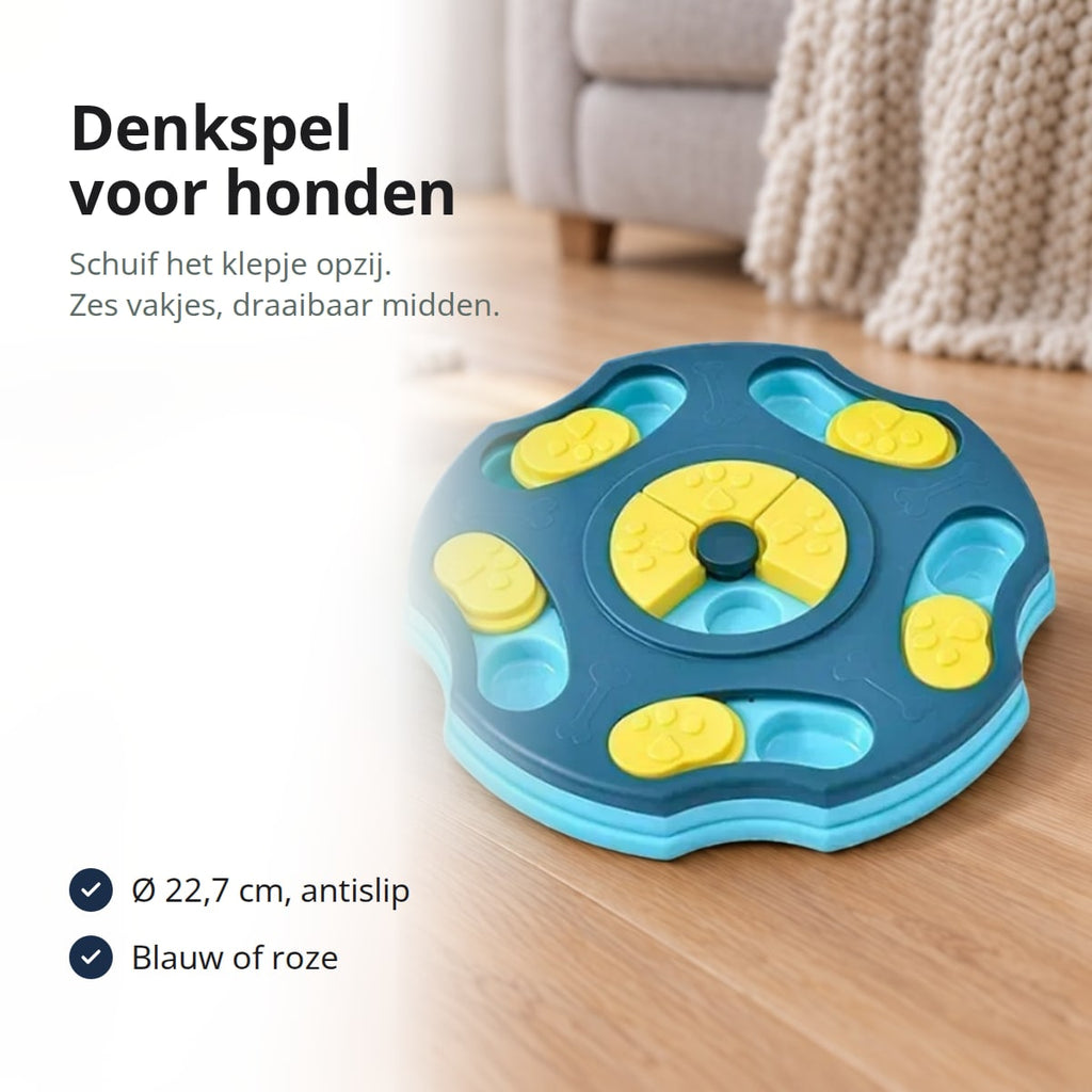 Blauw denkspel voor honden met gele schuifklepjes op een houten vloer, met de tekst: denkspel voor honden, schuif het klepje opzij, zes vakjes en een draaibaar midden; Ø 22,7 cm, antislip; blauw of roze