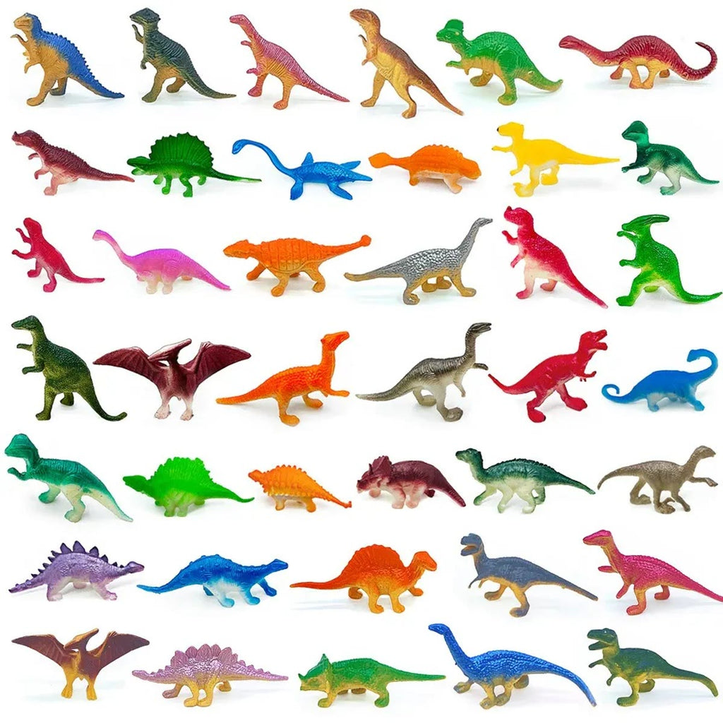 Een selectie van de dinosaurusfiguurtjes in rijen op een witte achtergrond, in veel kleuren en vormen