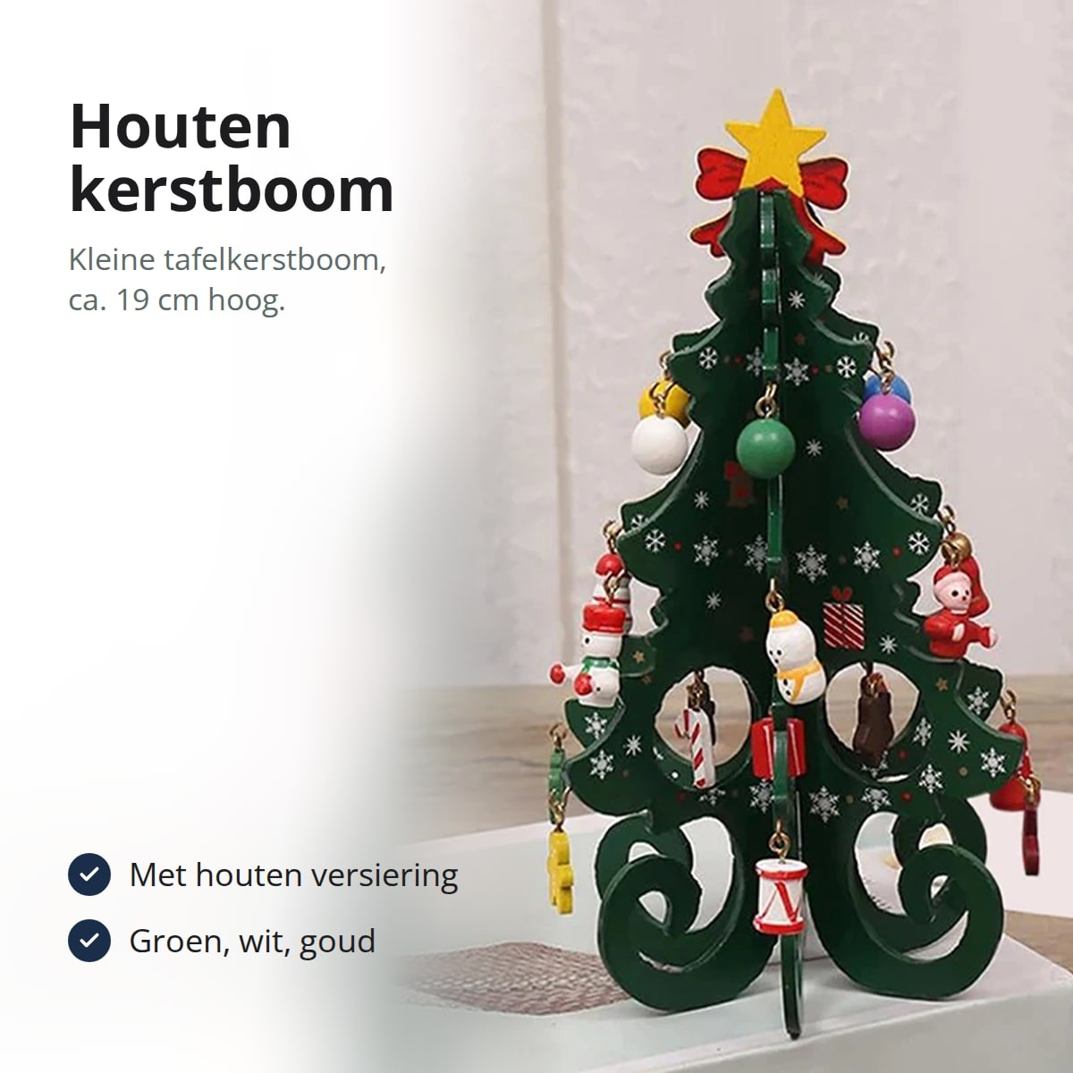Kleine houten kerstboom met ster, strik en kleine houten versieringen, met tekst: kleine tafelkerstboom van ca. 19 cm