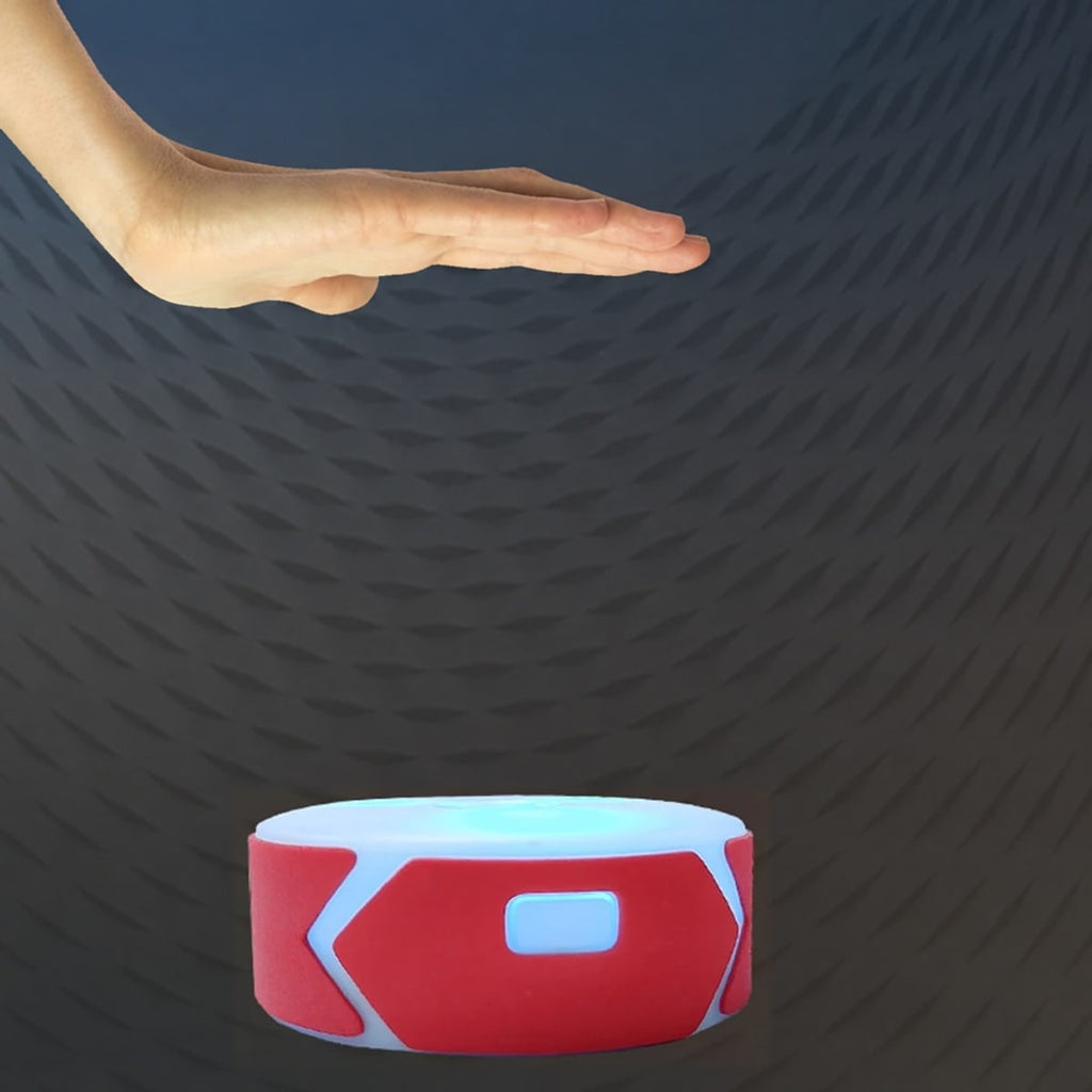 Een hand zweeft boven een reactie lampje met een rode rand: de sensor reageert op je hand