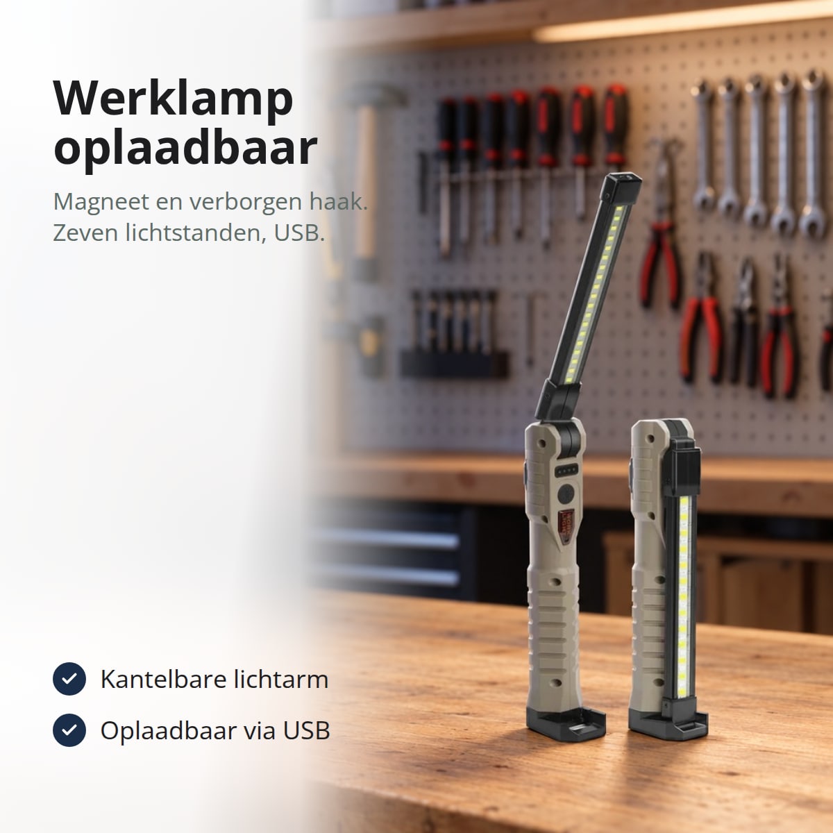 Twee inklapbare werklampen in kaki op een werkbank in een garage