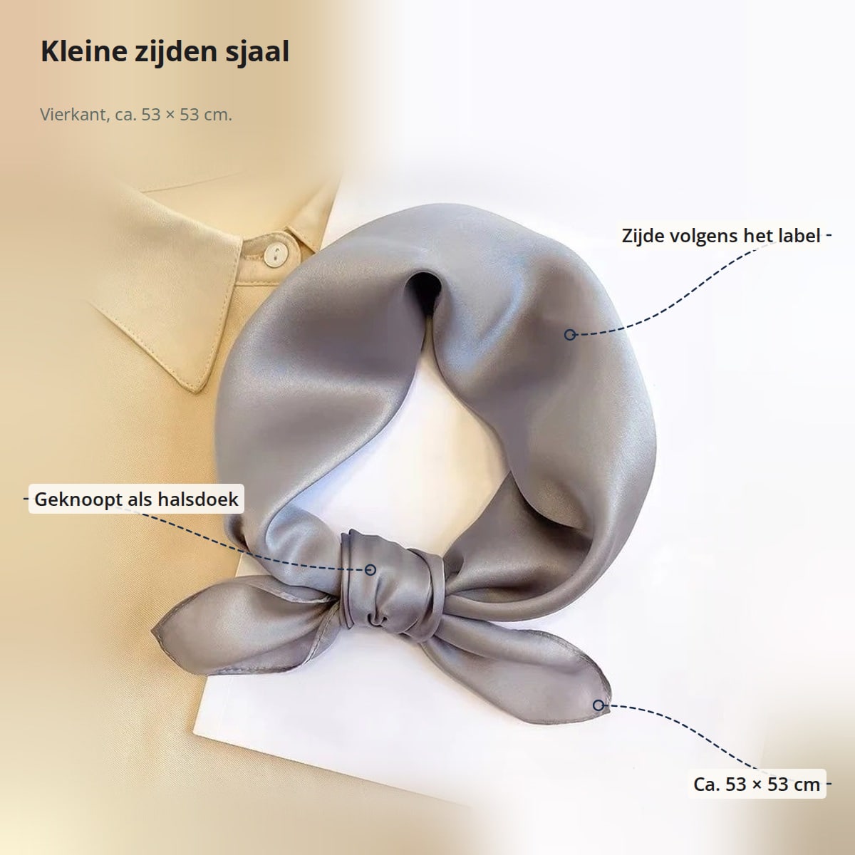 Grijze zijden sjaal met aanduidingen: zijde volgens het label, geknoopt als halsdoek en ca. 53 × 53 cm